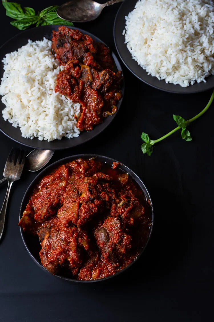 TOL stew and white rice with Chicken or Beef served with soda of choice